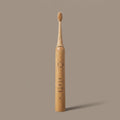 kabu toothbrush held in hand showing true size