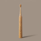 kabu toothbrush held in hand showing true size